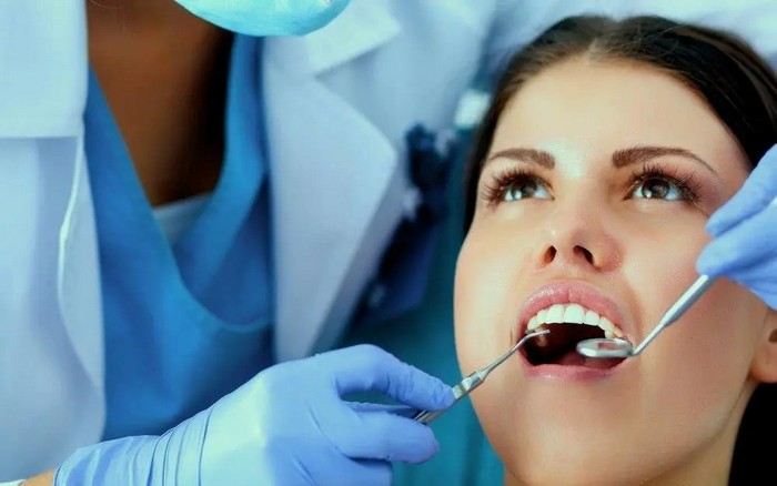 Симптомы кисты зуба